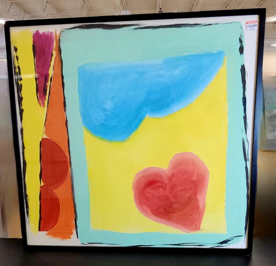 Between Whimsical & Pop Art is this vibrant abstract oil painting under glass. Signed 95". 30"x 30": This modernist abstract art piece is a great addition to any room, characterized by its bold color palette, including yellow, blue, red, orange, and magenta. The artwork incorporates a heart design