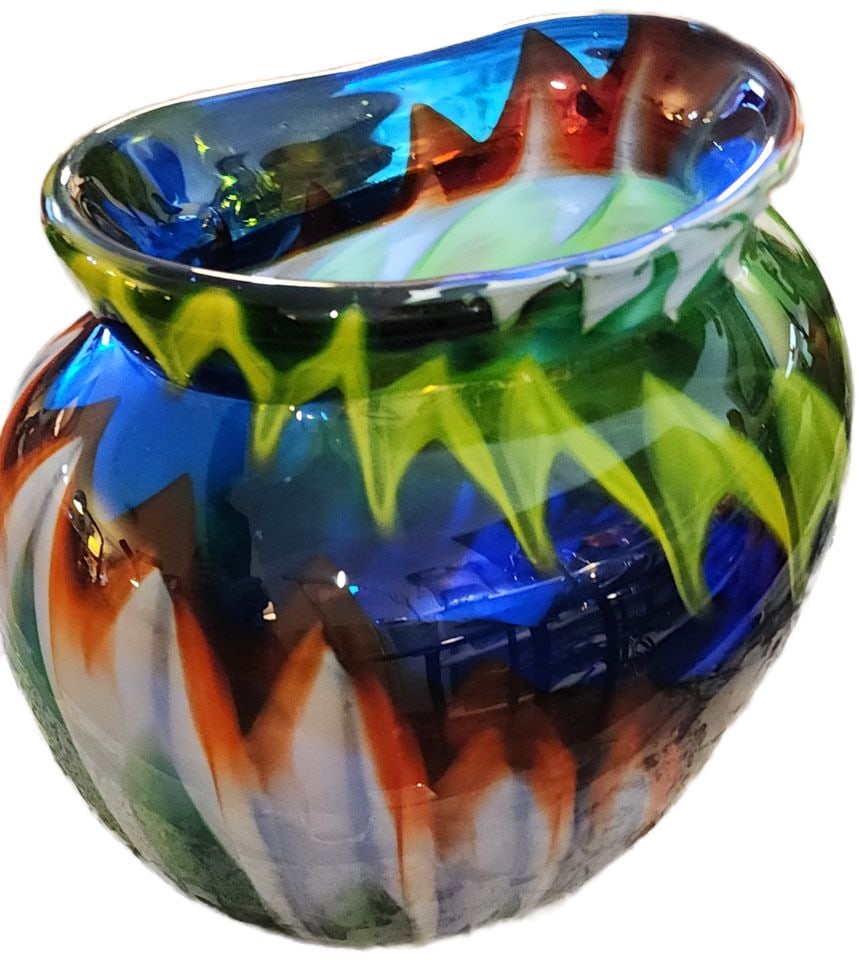 Heavy vintage Murano style art class vase w/ brilliantly colored abstract multi-imaged pattern.: Vibrant art glass vase with a bold high-contrast colored abstract pattern. This heavy glass piece has a blue, green, orange, and white flame-like design. The material is thick glass with a smooth, glo