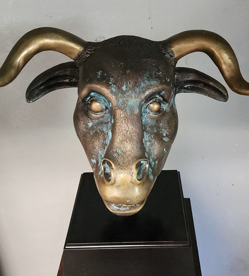 Powerful engraved bronze sculpture of Bull's head making strong artistic statement.: Powerful large vintage engraved bronze sculpture of Bull's head making strong artistic statement. Although the blue oxidation adds character to the piece, this can be polished out to the original pati