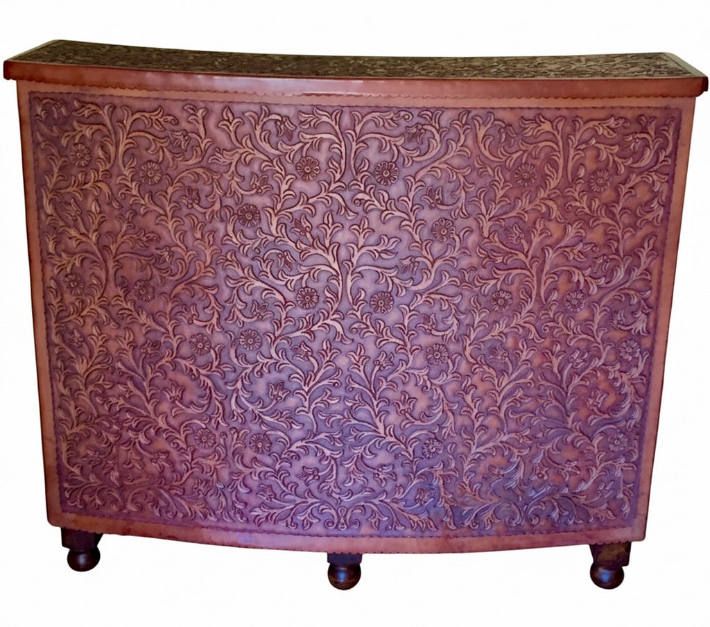 Hand-Tooled Leather Front Bar Cabinet / Console: A hand-tooled leather front bar cabinet or console, featuring elaborate floral and foliate motifs on the bowed front. The top and sides are also wrapped in the same rich brown tooled leather. The