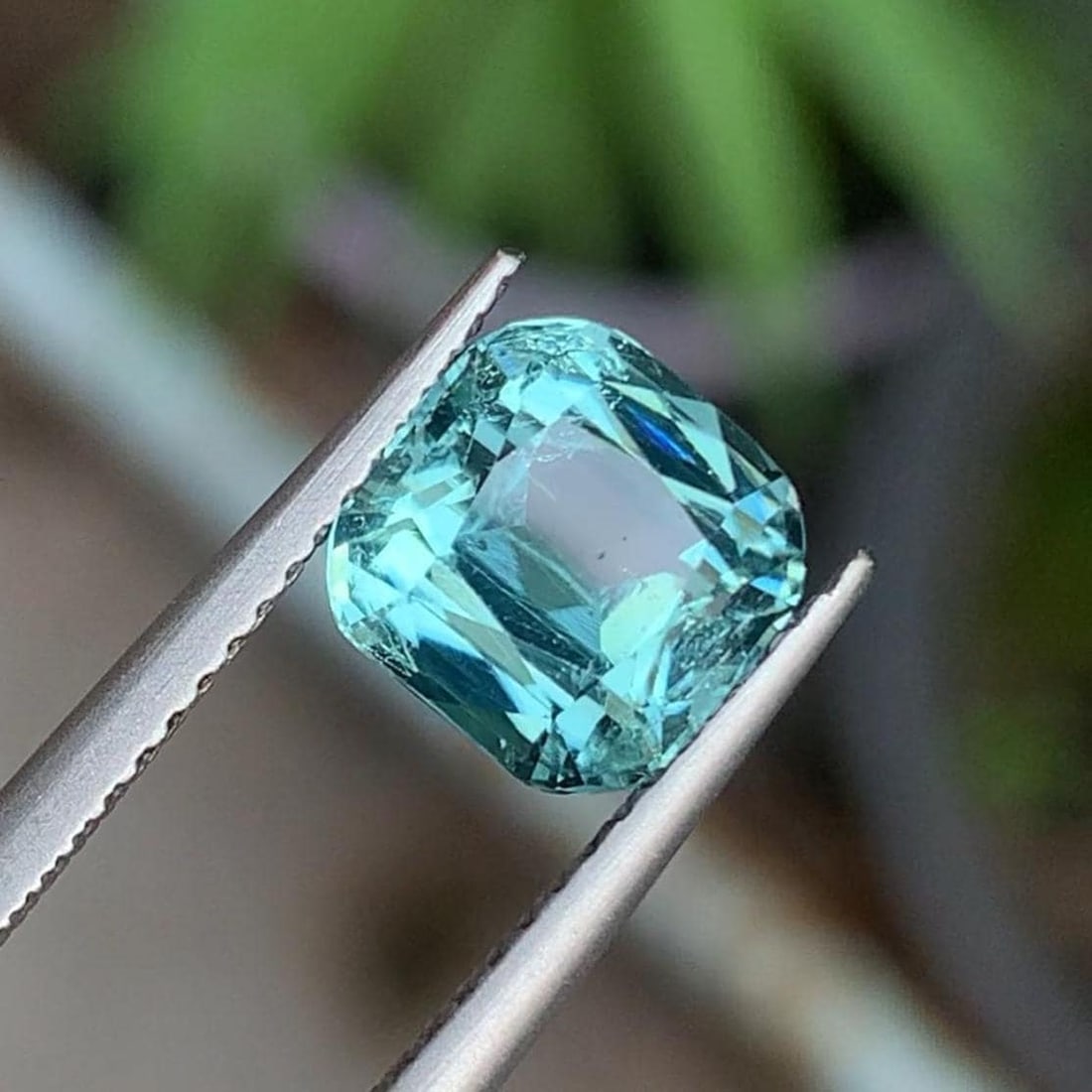 Natural Aqua Green Tourmaline Gemstone Cushion Cut For Ring Making From Afghanistan - 2.230 Carat: Pictures Are Taken Under Natural Daylight Gemology: * Weight : 2.230 carat * Dimension : 8.12*8.12*5.1 mm * Origin : Afghanistan * Colour: Elegant Aqua Green * Clarity : VVS * Shape : Cushion Cut * Ha