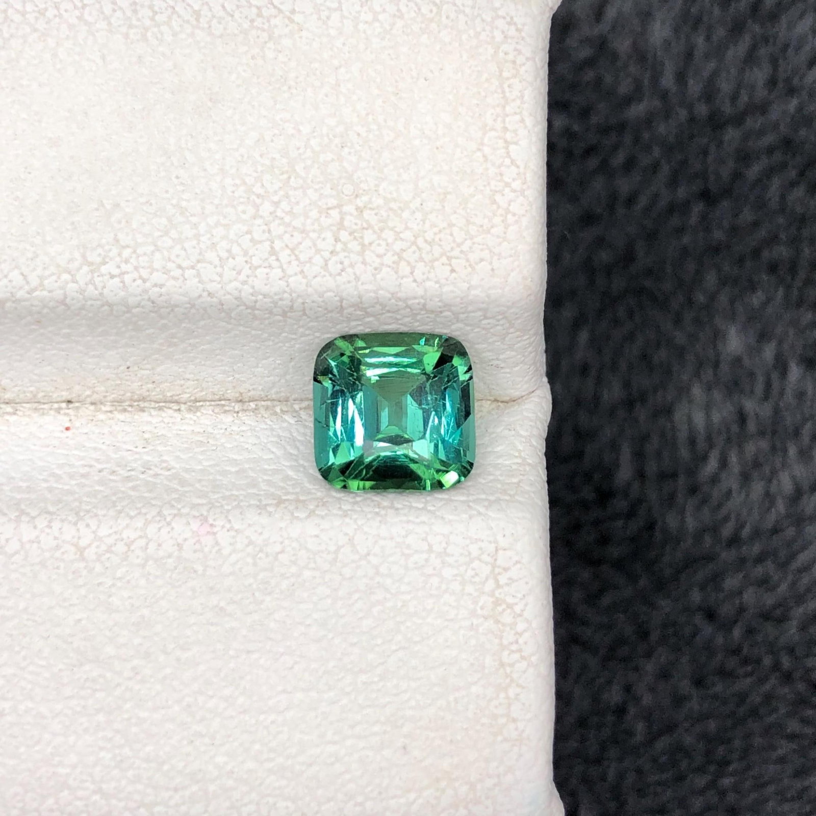 Blue Green Tourmaline Gemstone Ring Size Cushion Cut From Afghanistan - 1.27 Carat: Gemology: * Weight : 1.270 carat * Dimension : 6.4*6.4*4.1 mm * Origin : Afghanistan * Colour: Blue Green * Clarity : Vvs * Shape : Square Cushion Cut * Hardness : 6.5 - 7.5 * Mineral Class : Pyralspi