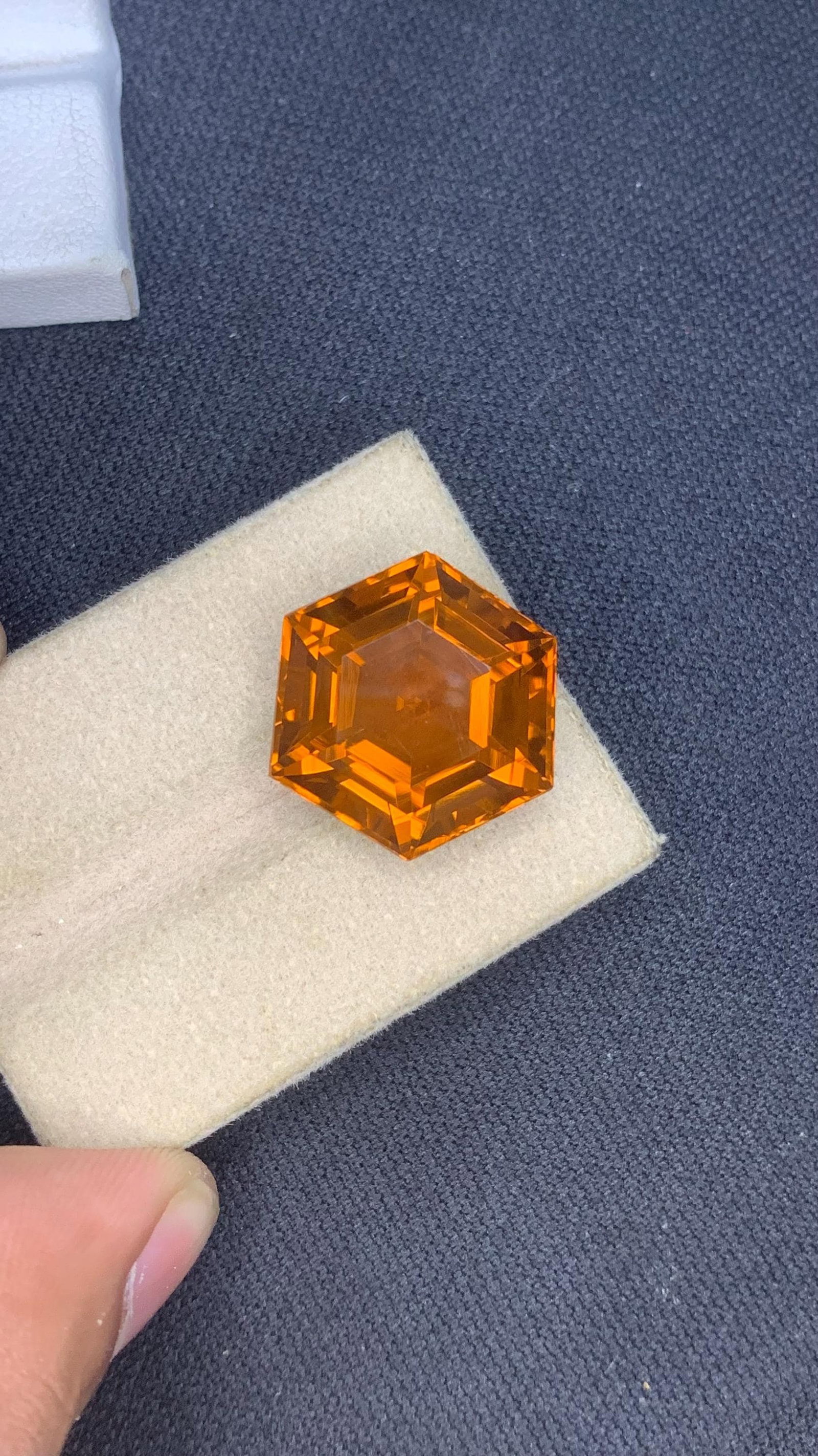 Honey Brown Citrine Hexagon Cut Orange Gemstone for Custom Jewelry - 19.40 Carat: Add a warm touch of brilliance to your jewelry designs with this striking hexagon-cut orange citrine gemstone. Featuring a rich honey-brown to amber-orange hue, this stone radiates golden warmth and c