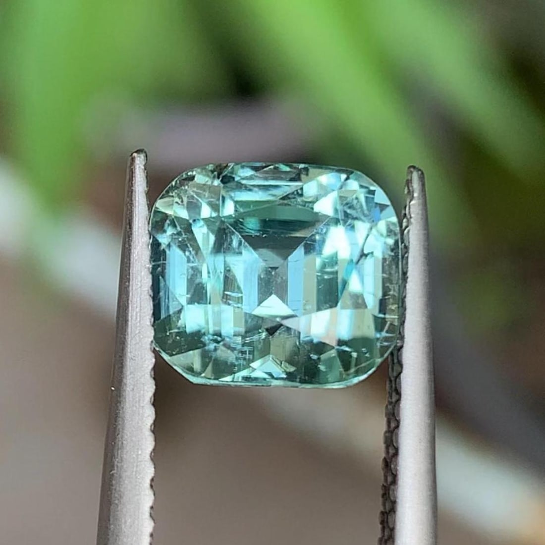 Natural Aqua Green Tourmaline Gemstone Cushion Cut For Jewelry Making From Afghanistan - 2.965 Carat: Pictures Are Taken Under Natural Daylight Gemology: * Weight : 2.965 carat * Dimension : 8.9*7.9*7.01 mm * Origin : Afghanistan * Colour: Elegant Aqua Green * Clarity : VVS * Shape : Cushion Cut *