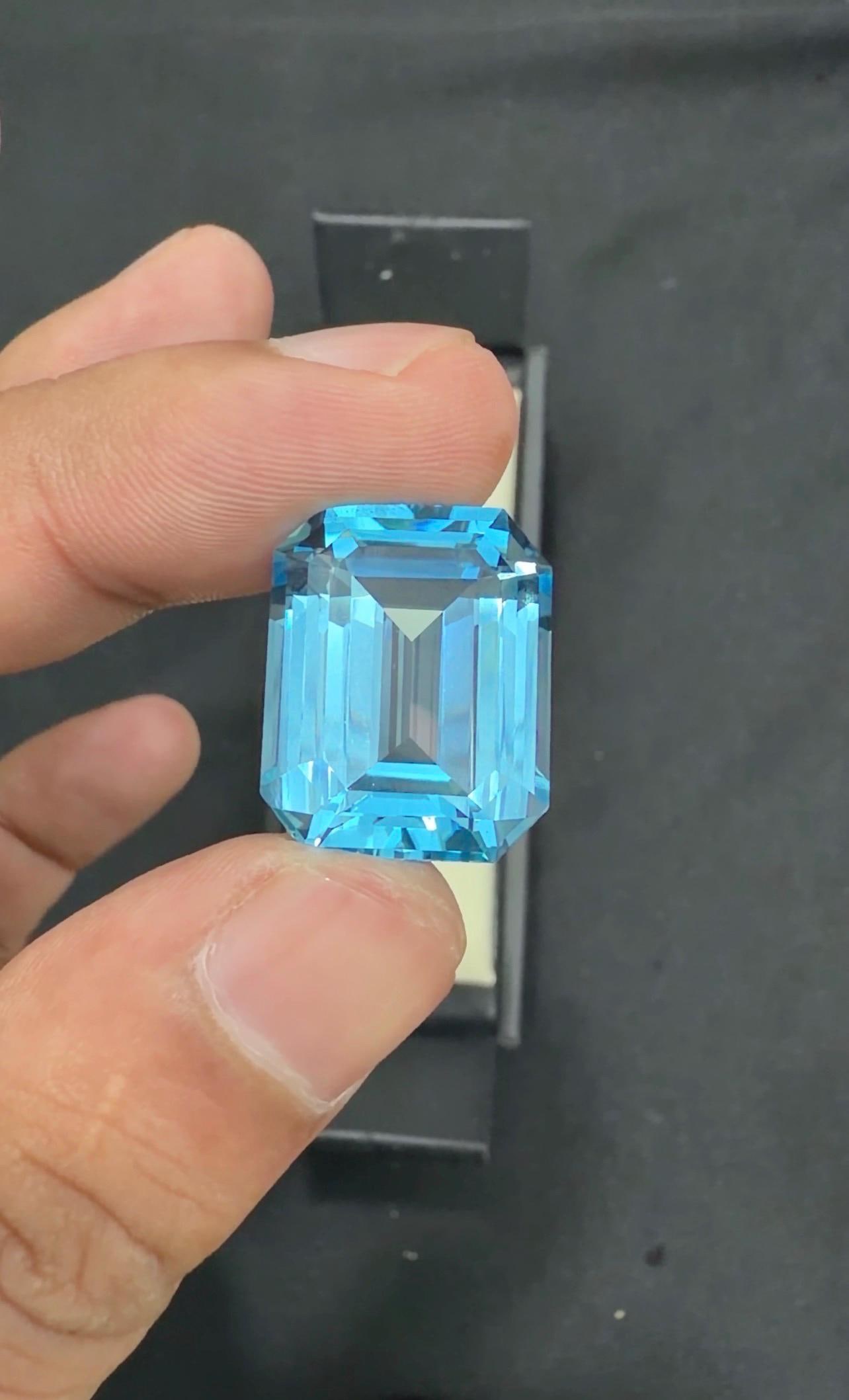 23.15 Carat Emerald Cut Swiss Blue Topaz Gemstone - 11