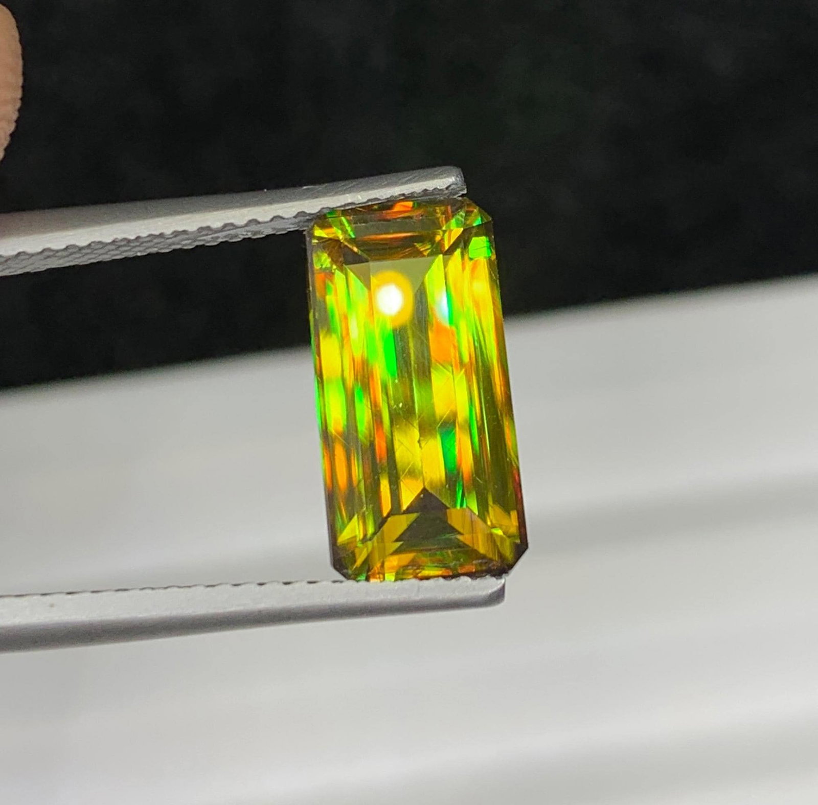 Natural Lustrous Sphene Gemstone: Multi Color Emerald Cut, 4.46 Carat: Highlights Supplies for making crafts Materials: Gemstone: Sphene Natural Lustrous Sphene Gemstone: Multi Color Emerald Cut Weight : 4.46 cts Dimensions : 13.2 * 7 * 4.6 MM Color : Yellow / Green Colo