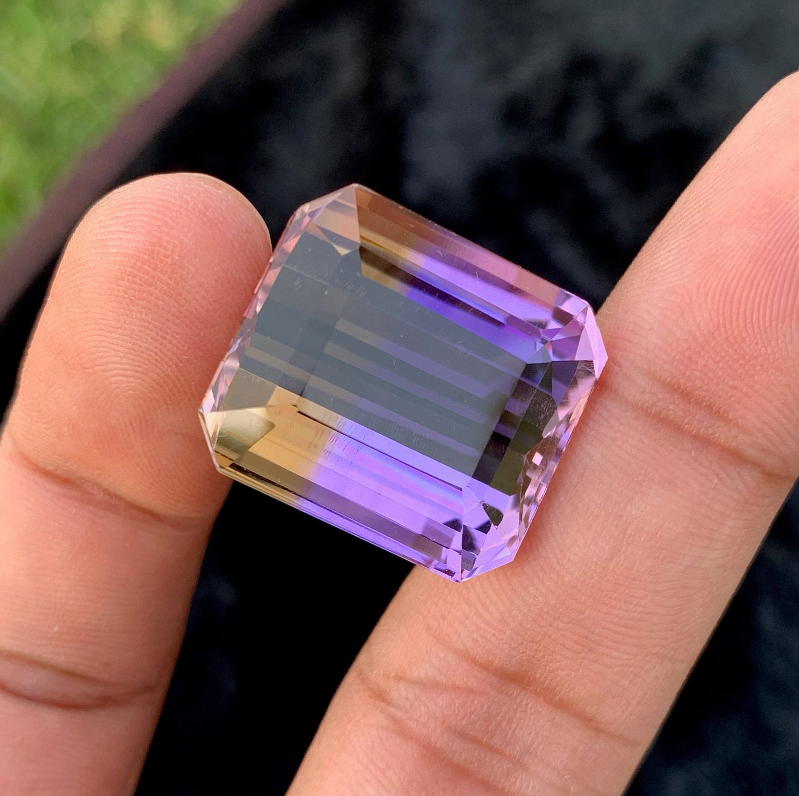 41.10 CT Bi Color Ametrine Gemstone: Long Emerald Cut, Eye Clean: Experience the allure of a 41.10 CT top-grade Bi Color Ametrine loose gemstone, showcasing a captivating blend of sparkling hues. This unique gem boasts a long Emerald Cut, perfect for crafting exquis