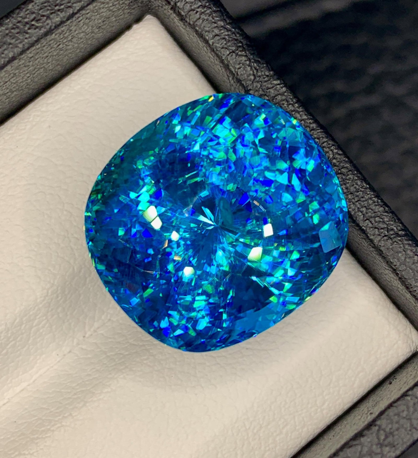 Natural Cambodia Blue Zircon 44.20 Carat Loose Gemstone - Large Faceted Blue Zircon for Ring Pendant: Natural Blue Zircon from Cambodia, weighing an impressive 44.20 carats. Renowned for its dazzling brilliance and vivid blue color, this exceptional gemstone is a true collector's piece. Carefully face