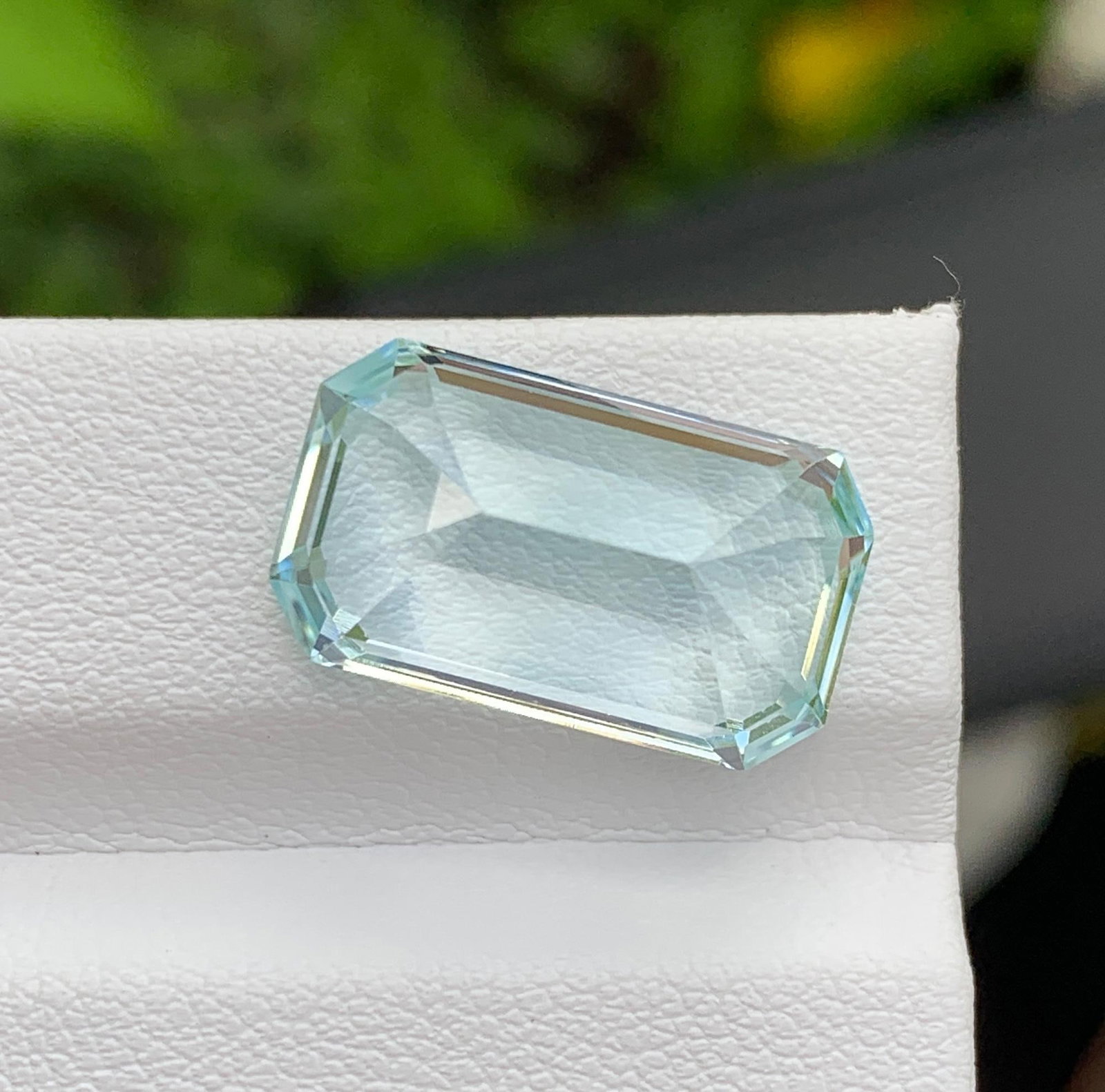 Natural Pakistan Aquamarine Gemstone 11.90 Carat Emerald Cut - Loose Sky Blue Aquamarine for Ring: Discover the breathtaking beauty of this Natural Pakistan Aquamarine weighing an impressive 11.90 carats. Expertly fashioned in an elegant Emerald Cut, this gemstone showcases a captivating sky-blue c
