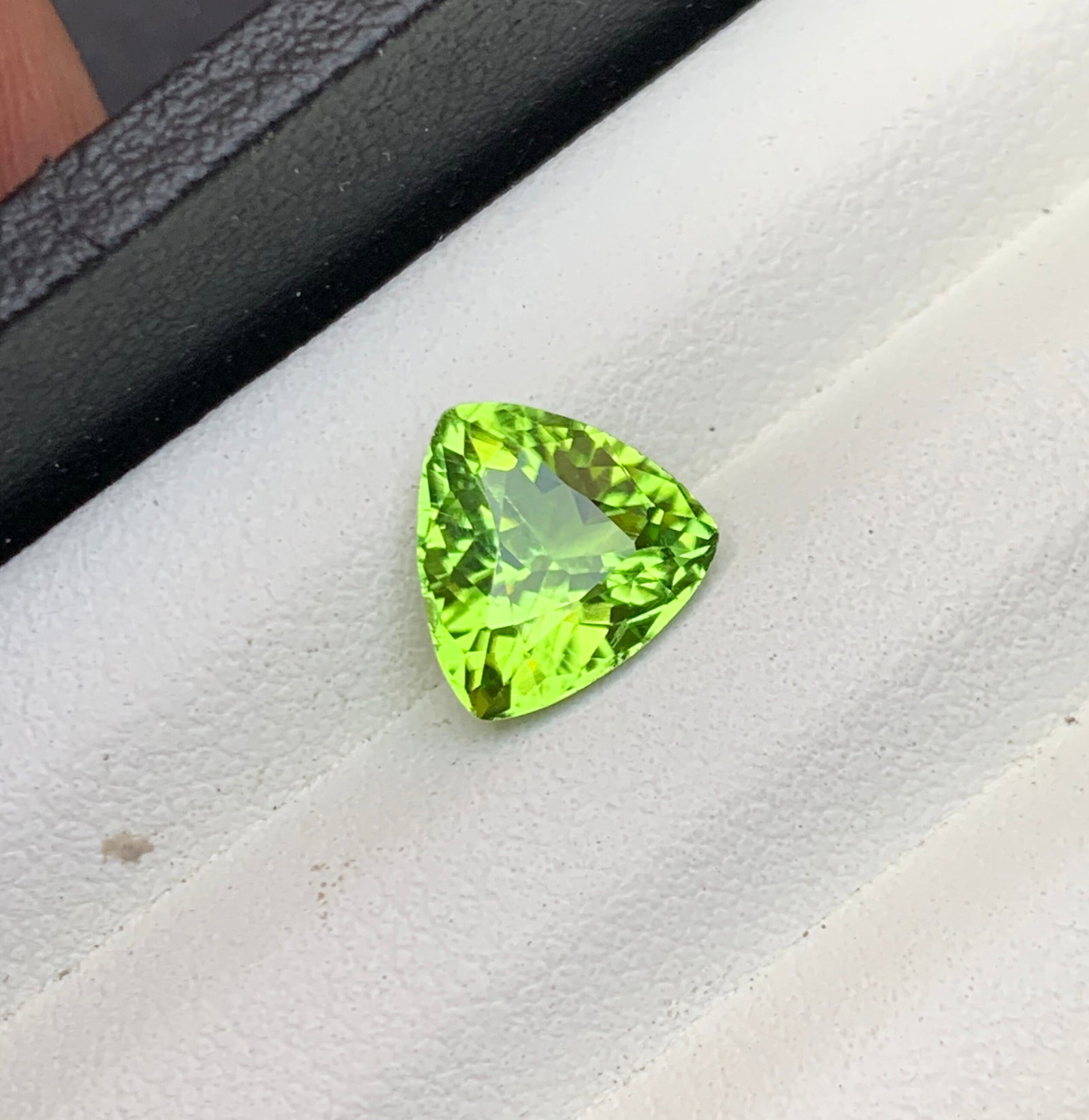Natural Peridot Gemstone: Trillion Cut Loose Gem, 2.50 Carats: Natural Peridot Gemstone ,Green Color, Trillion Cut ,Rings and Jewelry Size peridot Loose Gemstone, 2.50 Carats. Weight : 2.50 Carats Dimensions : 9*9*6 Zodiac sign : Leo Birthstone: August Hardness :