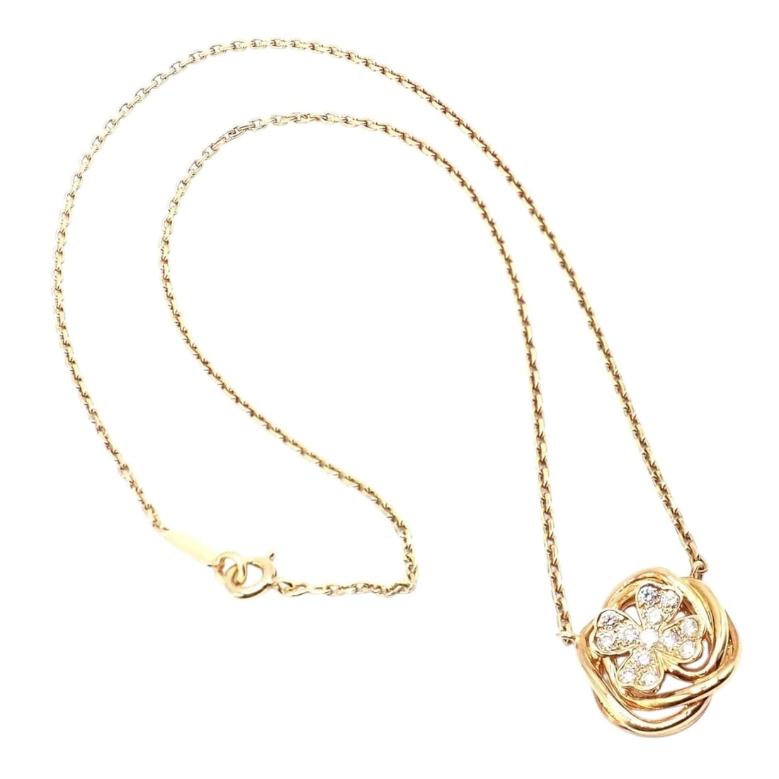 Gold chain necklace with central teardrop pendant featuring four round diamonds, linked by gold leaf: This authentic Chanel pendant necklace is crafted in 18k gold, featuring a diamond-set four leaf clover motif within a sculptural open circular frame. Suspended from a classic link chain, this elegant