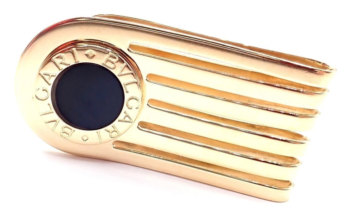 Vintage! Authentic Bulgari Bulgari 18k Yellow Gold Onyx Money Clip: Vintage! Authentic Bulgari Bulgari 18k Yellow Gold Onyx Money Clip About This Piece: Metal: 18k Yellow Gold Measurements: 49mm x 24mm Weight: 22.1 grams Stone: Onyx 11mm Hallmarks: Bvlgari 750 Made