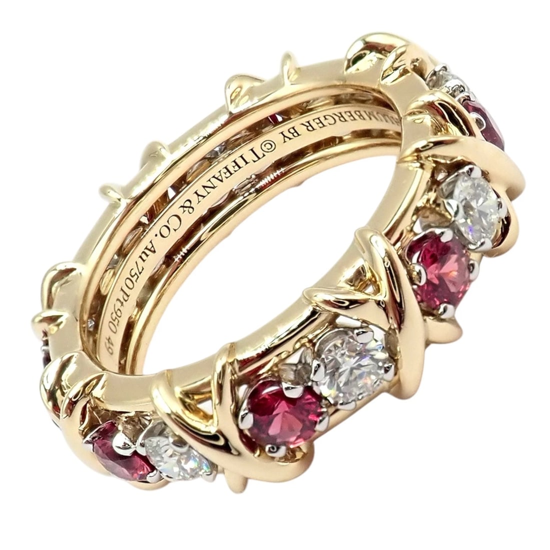 Tiffany & Co Schlumberger 18k Gold Platinum 16 Stone Diamond Ruby Band Ring Sz 5: Crafted in 18k gold and platinum, this Tiffany & Co. Schlumberger 16 Stone band ring features alternating round brilliant diamonds and vivid rubies. Signature X motifs gracefully embrace each gem, cre