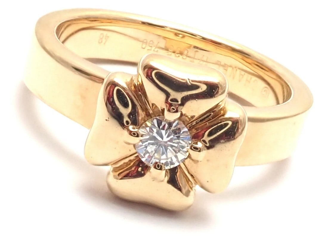 Authentic! Chanel 18k Yellow Gold Diamond Four Leaf Clover Ring: Authentic! Chanel 18k Yellow Gold Diamond Four Leaf Clover Ring About This Piece: Metal: Diamond: 18k Yellow Gold Round Brilliant Cut 0.12 ct. G/VS1 Ring size: US - 4.25. French - 48 Weight: 6.1 grams