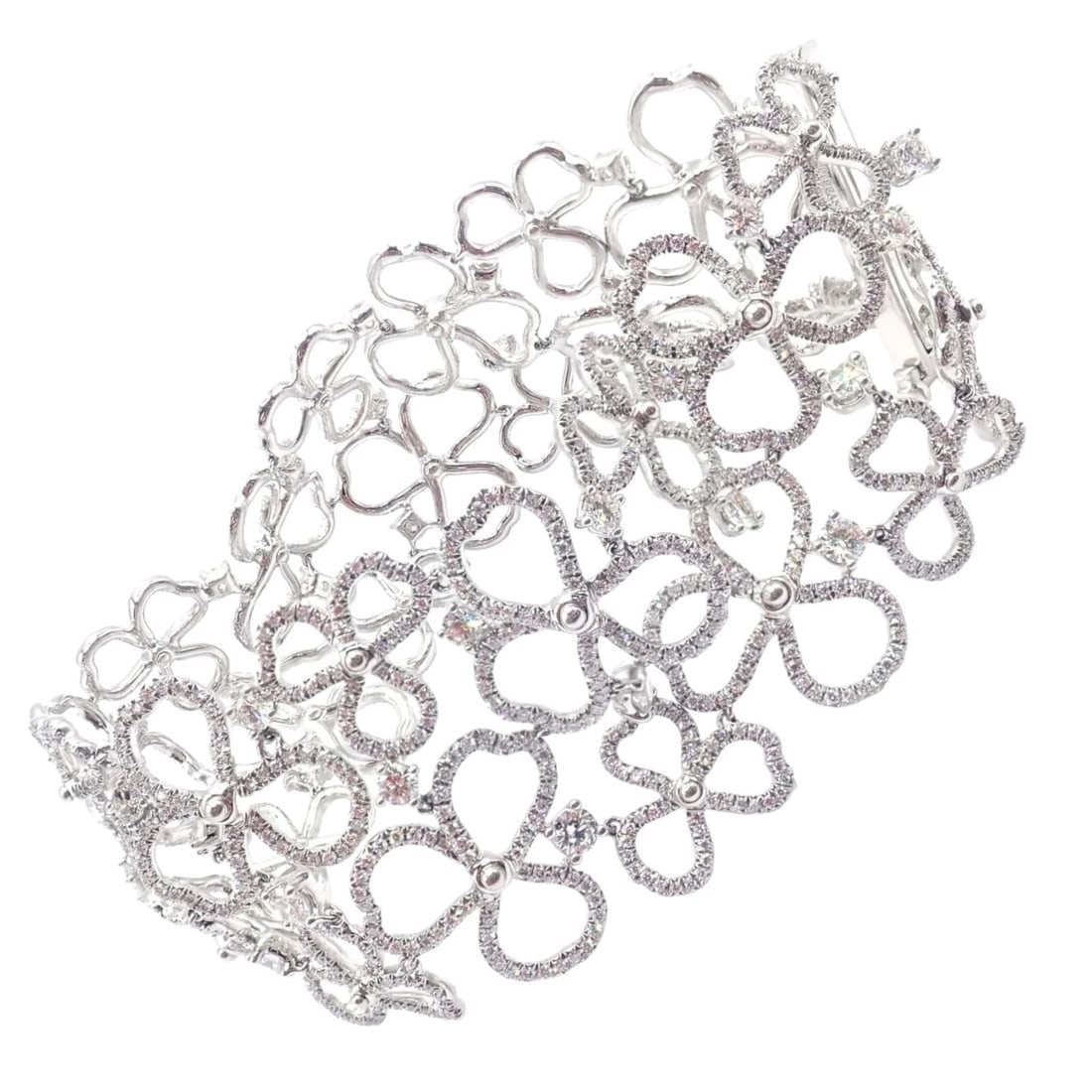 Authentic! Tiffany & Co Paper Flowers Platinum Diamond Wide Bracelet: Authentic! Tiffany & Co Paper Flowers Platinum Diamond Wide Bracelet About This Piece: The Tiffany & Co Paper Flowers Bracelet is a stunning piece crafted in platinum. It features an intricate floral 