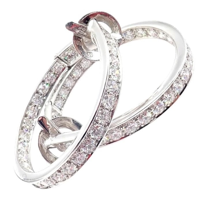 Authentic! Van Cleef & Arpels 18k White Gold Diamond Large Hoop Earrings: Authentic! Van Cleef & Arpels 18k White Gold Diamond Large Hoop Earrings About This Piece: These Van Cleef & Arpels large hoop earrings are exquisitely crafted in 18k white gold and adorned with brill