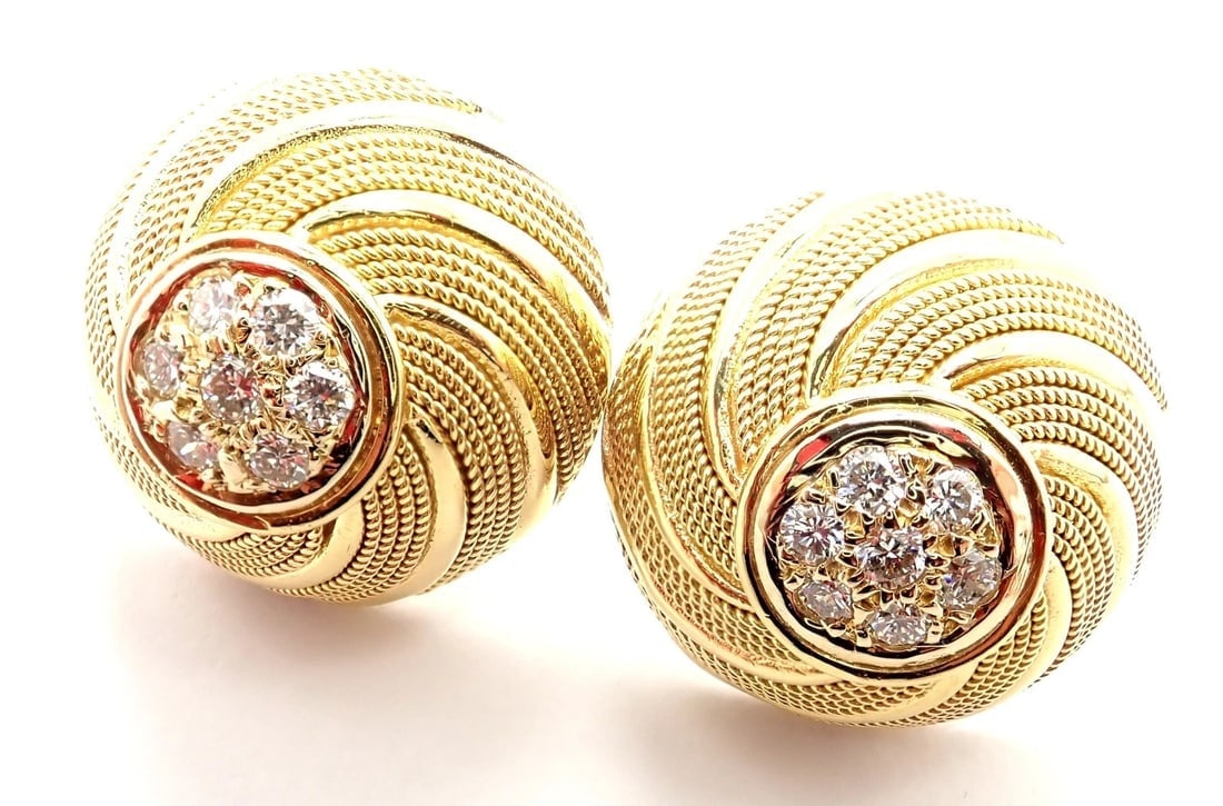 Rare! Authentic Tiffany & Co 18k Yellow Gold Diamond Earrings: Rare! Authentic Tiffany & Co 18k Yellow Gold Diamond Earrings About This Piece: These earrings are for pierced ears. Metal: 18k Yellow Gold Measurements: 20mm Weight: 18.2 grams Stones: **** 14 round 