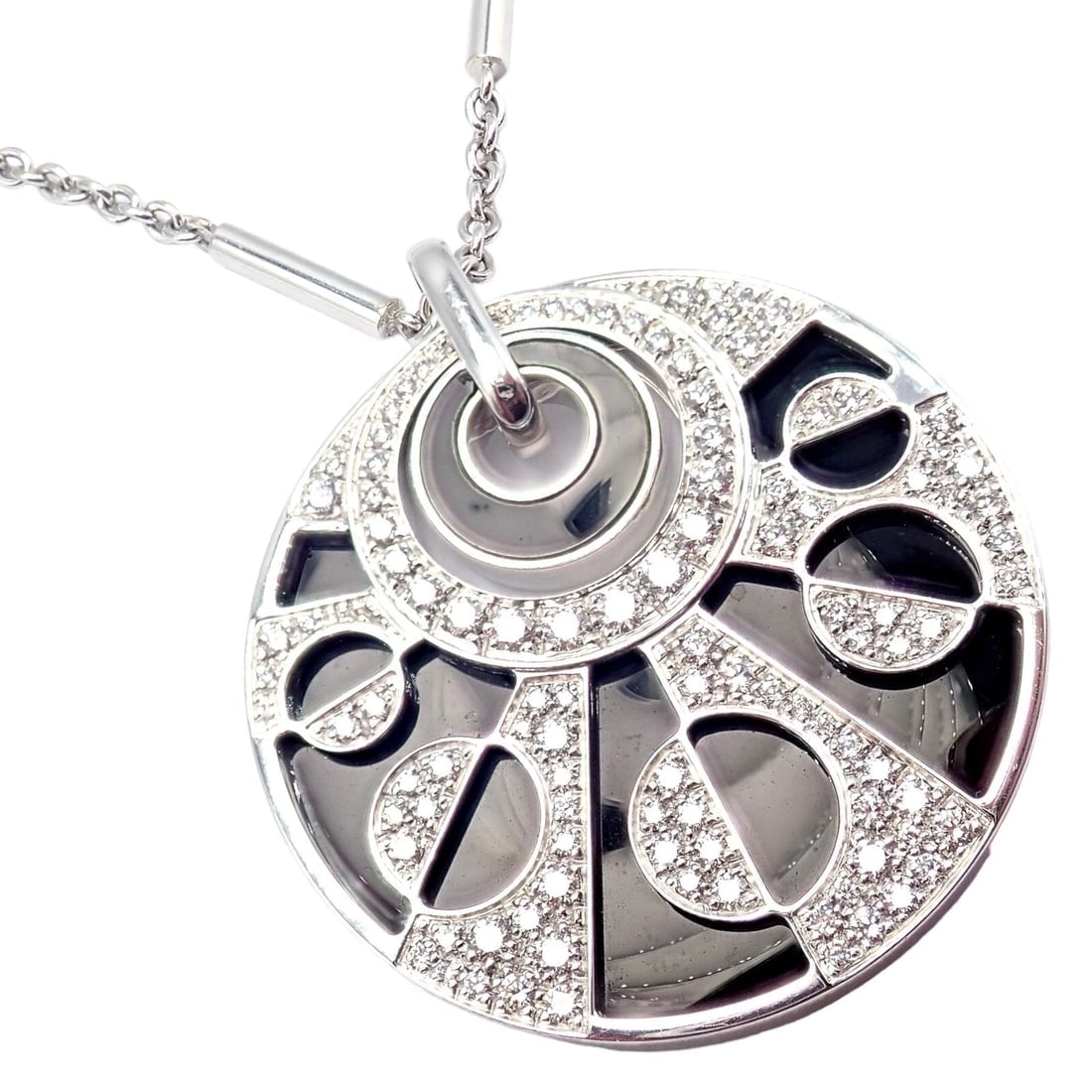 Authentic Bvlgari Bulgari Intarsio 18k White Gold 5ctw Diamond Onyx 18" Necklace: Authentic Bvlgari Bulgari Intarsio 18k White Gold 5ctw Diamond Onyx 18" Necklace About This Piece: The Authentic Bvlgari Intarsio necklace is a masterpiece of unparalleled elegance, meticulously craft