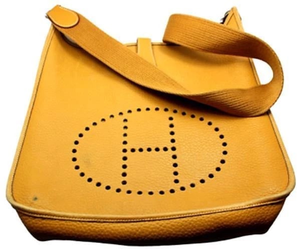 Authentic! Hermes Evelyne Dark Tan Clemence Leather GM Handbag Purse: Authentic! Hermes Evelyne Dark Tan Clemence Leather GM Handbag Purse About This Piece: Bag Hermes Evelyne Yellow/Brass Hardware Size: 13 inches x 12.75 inches x 3 inches Strap: 17" strap drop ALL MEAS