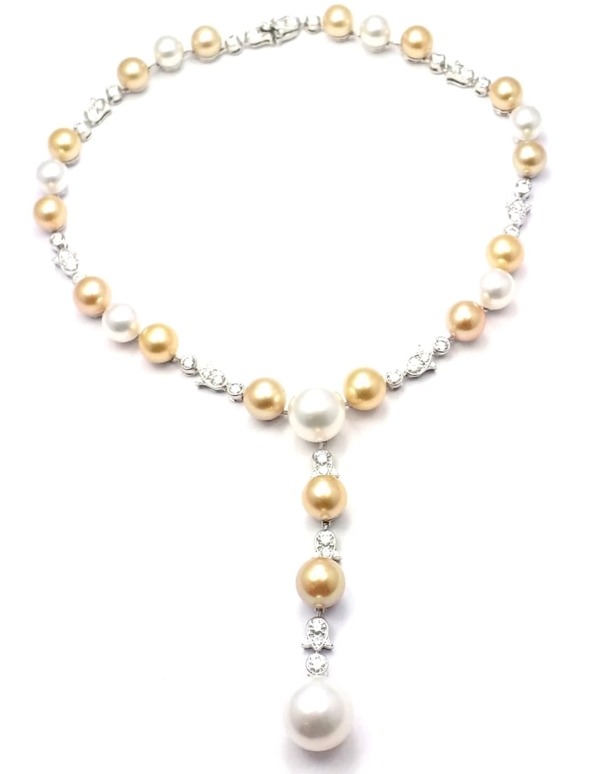 Authentic! Cartier Calin Platinum Diamond Tahitian & South Sea Pearl Necklace: Authentic! Cartier Calin Platinum Diamond Tahitian & South Sea Pearl Necklace About This Piece: Metal: Platinum Measurements: Length: 14.5'' plus 3" drop Weight: 82.1 grams Stones: Round Brilliant Cut