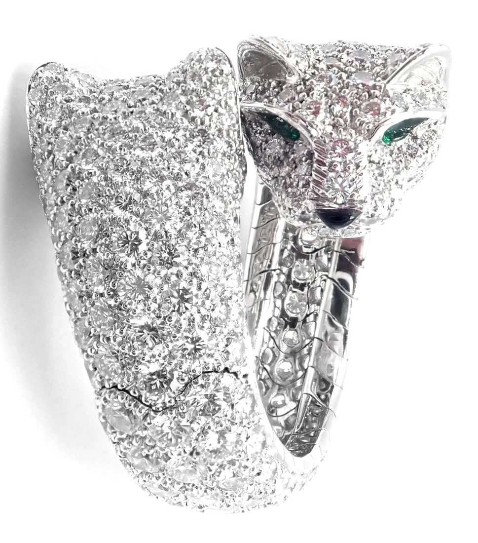 Authentic! Cartier Double Panther Panthere Lakarda 18k Gold Diamond Emerald Ring: Authentic! Cartier Double Panther Panthere Lakarda 18k Gold Diamond Emerald Ring About This Piece: Metal: 18k White Gold Measurements: Width: 22mm Weight: 21.8 grams Stones: Round brilliant cut diamon