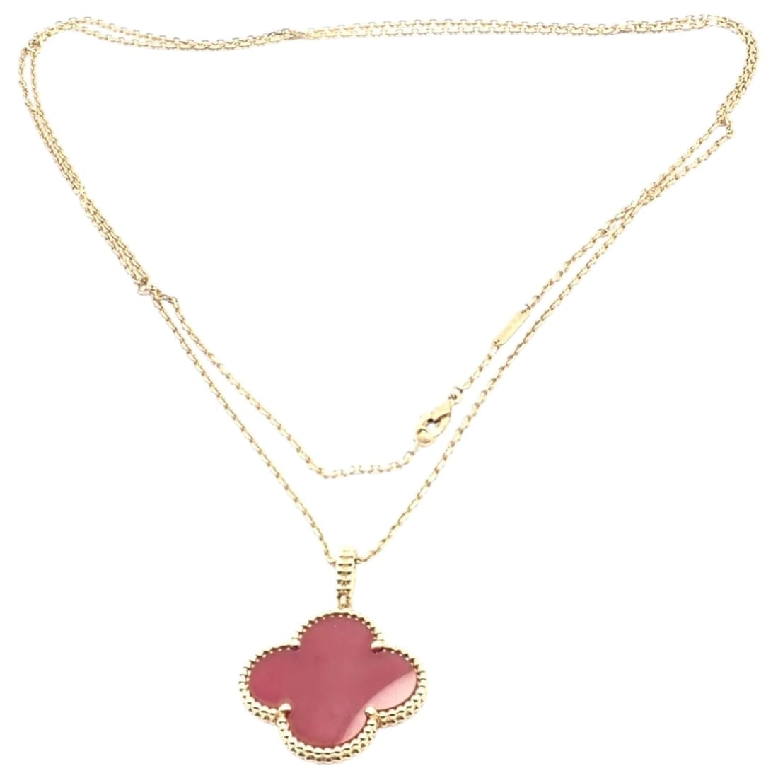 Van Cleef & Arpels 18k Gold Magic Alhambra Carnelian Motif Long Necklace Cert: Van Cleef & Arpels Magic Alhambra necklace crafted in 18k yellow gold, showcasing an elegant oversized carnelian motif framed with signature beaded edges. Warm, rich red tones evoke luck and vitality,