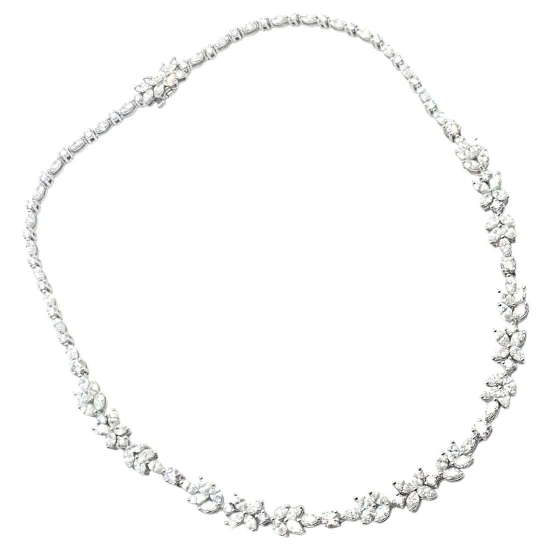 Tiffany & Co Victoria Platinum 15.92ct Diamond Mixed Cluster Necklace Paper: Tiffany & Co Victoria Platinum 15.92ct Diamond Mixed Cluster Necklace Paper About This Piece: The Tiffany & Co. Victoria Mixed Cluster Necklace is a luxurious piece crafted in platinum, featuring 15.9