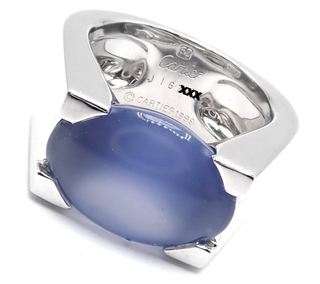 Authentic! Cartier 18k White Gold Large Chalcedony Ring Paper: Authentic! Cartier 18k White Gold Large Chalcedony Ring Paper About This Piece: Metal: 18k White Gold Size: 6 or 52 (European) Stones: 1 Chalcedony 10 x 15 mm Weight: approx. 20.9 grams Hallmarks: Car