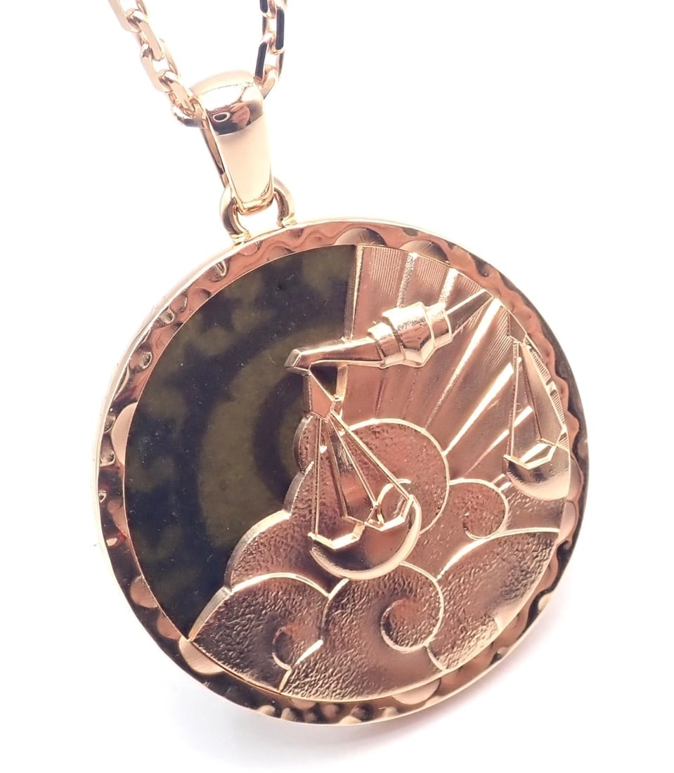 Van Cleef & Arpels Zodiaque18k Rose Gold Libra Pendant Obsidian Necklace Cert.: Van Cleef & Arpels Zodiaque18k Rose Gold Libra Pendant Obsidian Necklace Cert. About This Piece: The Van Cleef & Arpels Zodiaque necklace features a Libra pendant in 18k rose gold, set against a strik