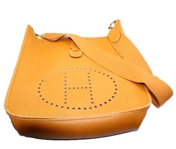 Authentic! Hermes Evelyne Natural Tan Clemence Leather GM Handbag Purse: Authentic! Hermes Evelyne Natural Tan Clemence Leather GM Handbag Purse About This Piece: Bag Hermes Evelyne Yellow Hardware Size: 13 inches x 12.75 inches x 3 inches Strap: 19" strap drop ALL MEASURE
