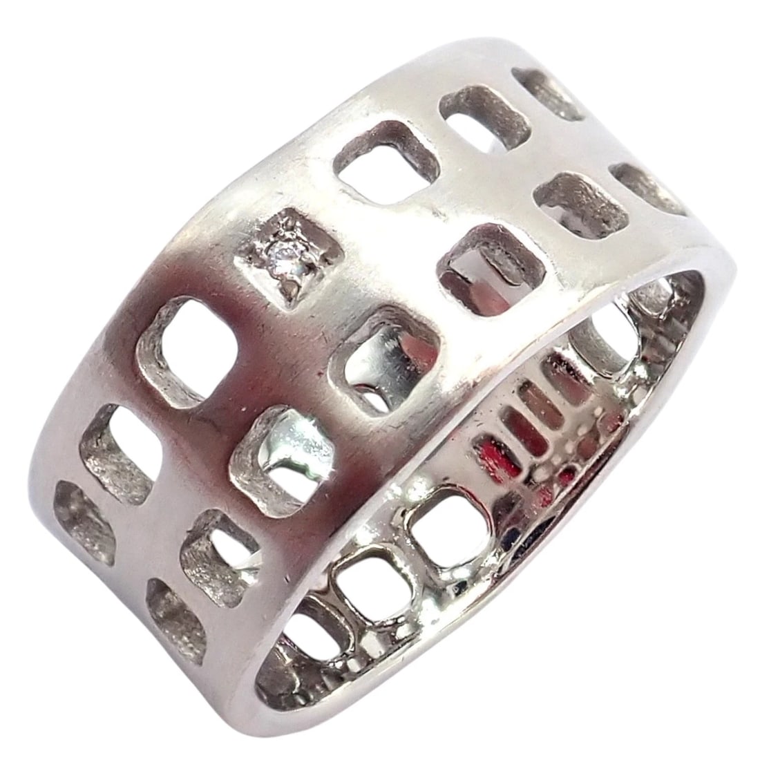 Authentic! H. Stern 18k White Gold Diamond Square Hole Modernist Band Ring sz 6: This authentic H. Stern band ring is crafted in 18k white gold with a bold modernist design. The wide curved silhouette features an open square-hole lattice pattern throughout, creating striking dimen