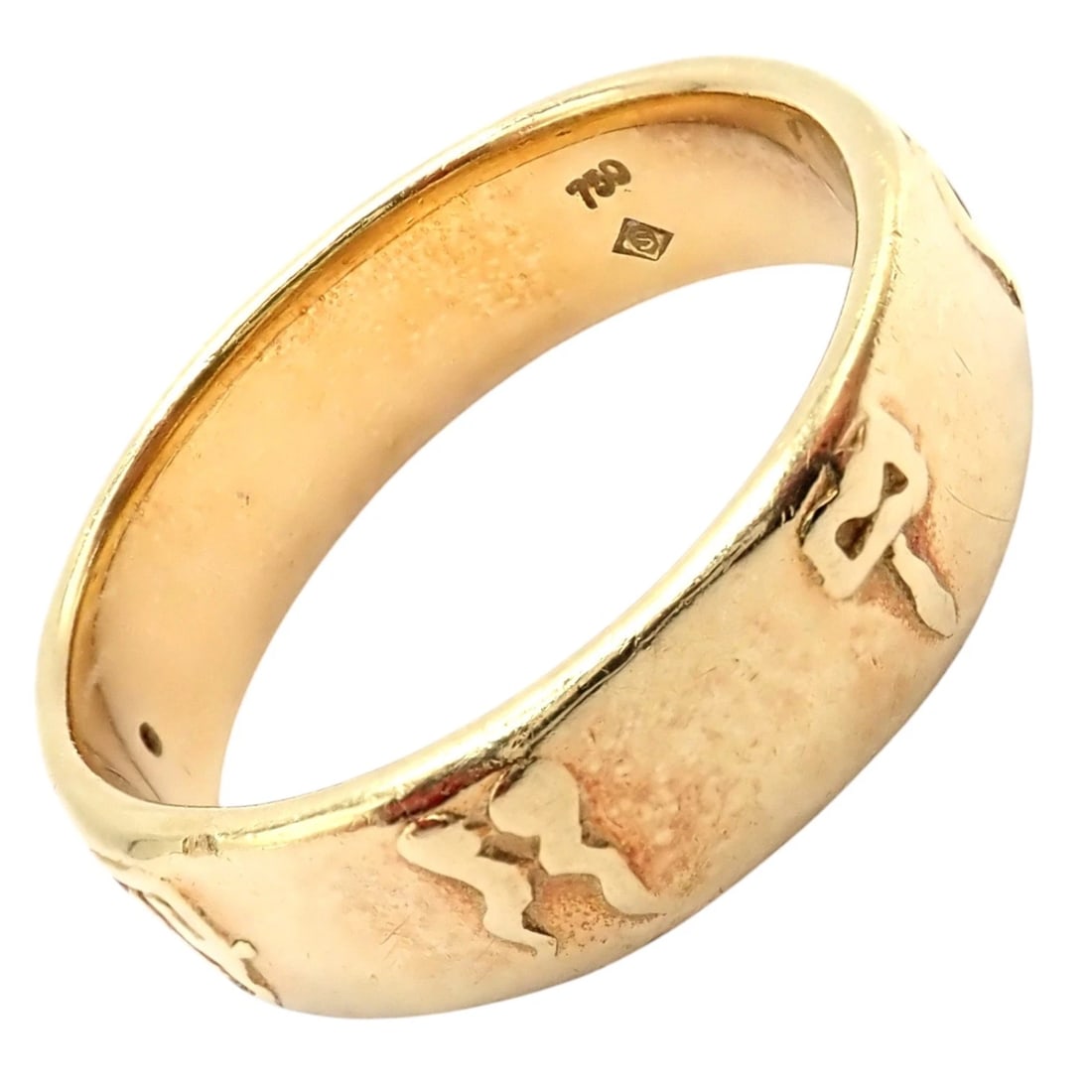 Authentic! H. Stern 18k Yellow Gold Diamond Glyph Band Ring sz 7: This authentic H. Stern band ring is crafted in 18k yellow gold with a wide polished silhouette and small diamond accent. The exterior features raised abstract symbolic motifs, possibly Hebrew-inspire