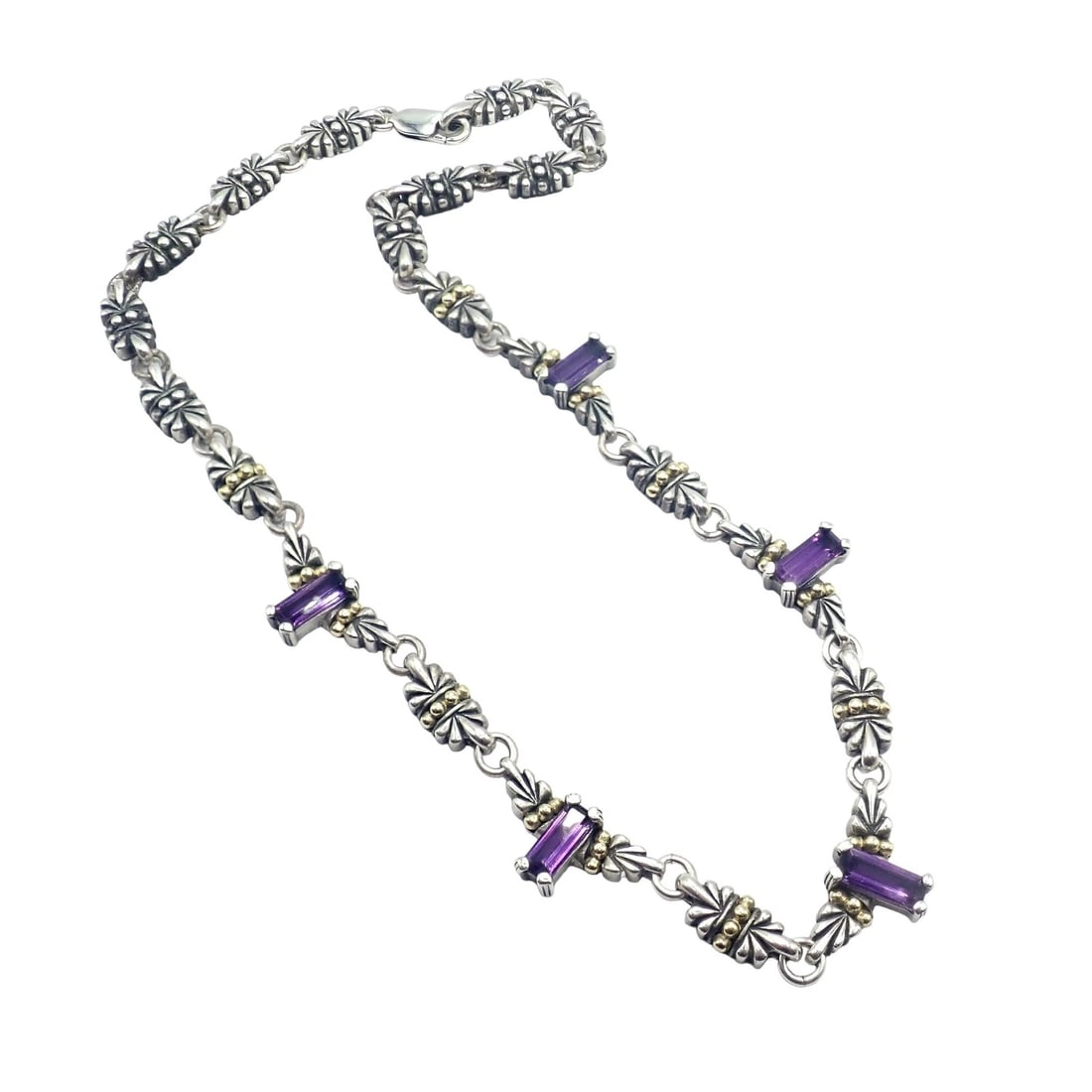 Authentic! Lagos Caviar Silver + 18k Yellow Gold Amethyst Necklace: The Lagos Caviar Necklace is an exquisite piece featuring 5 captivating amethyst gemstones. Crafted in sterling silver and 18k yellow gold, its signature caviar beading adds texture and elegance. This