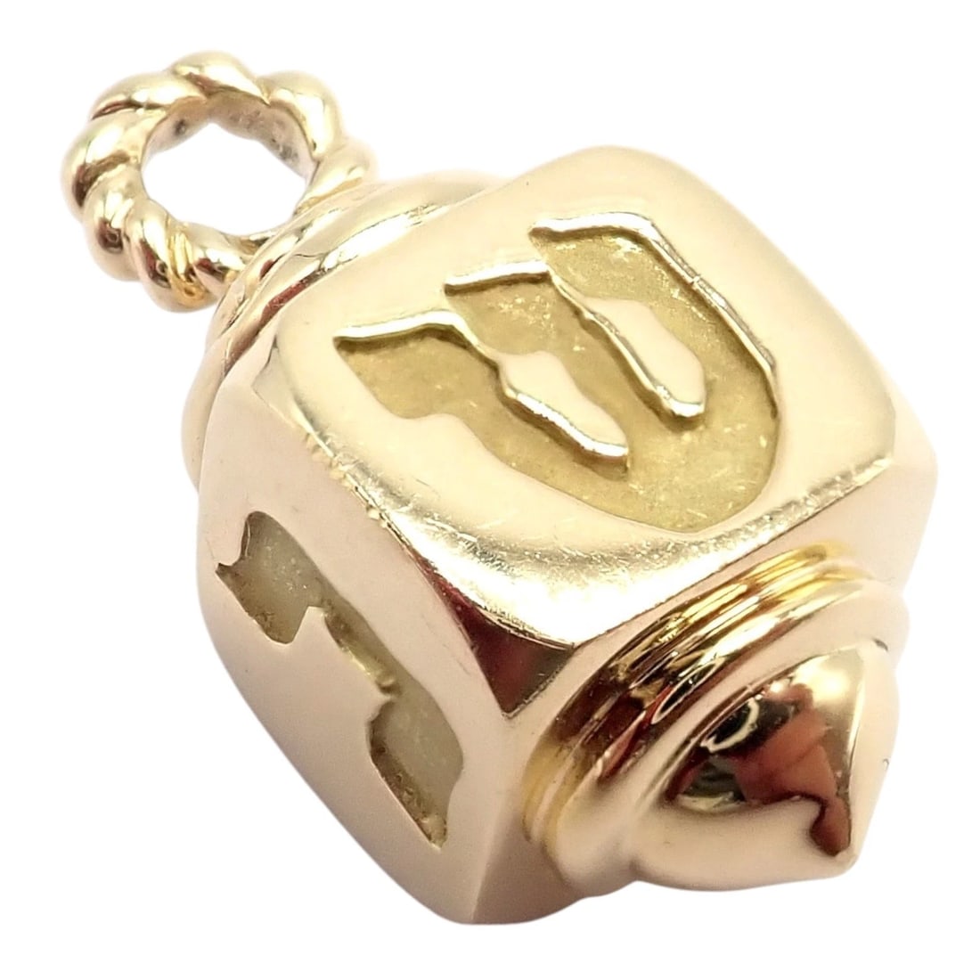 Ultra Rare Vintage Tiffany & Co. 18k Yellow Channukah Dreidel Charm Pendant: Ultra rare vintage Tiffany & Co. Channukah dreidel charm pendant crafted in 18k yellow gold. Beautiful dimensional design with Hebrew letter cutouts, polished finish, and twisted rope bail. A meaningf