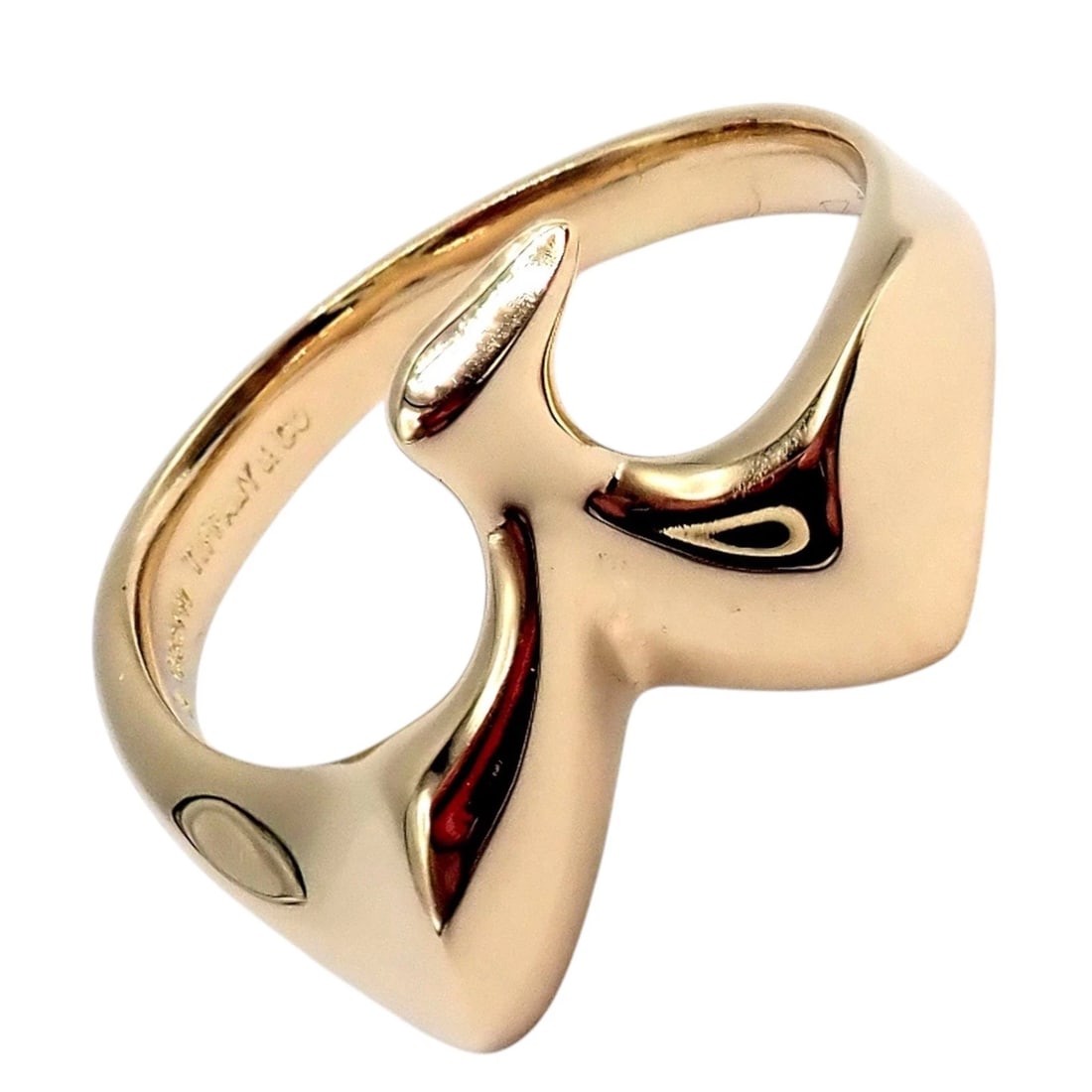 Authentic! Vintage Tiffany & Co. 18k Yellow Gold Peretti Bird Ring Sz 5: Crafted in 18k yellow gold, this vintage Tiffany & Co. Elsa Peretti Bird ring features a sleek, sculptural silhouette inspired by nature. The fluid, minimalist design wraps gracefully around the finge