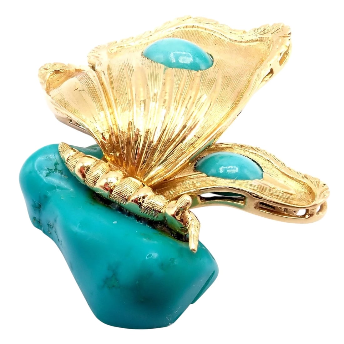 Vintage Tiffany & Co. 18k Yellow Gold Turquoise Butterfly On A Rock Pin Brooch: Vintage Tiffany & Co. 18k yellow gold brooch features a sculptural butterfly perched atop a vivid turquoise “rock.” Textured gold wings with turquoise accents create lifelike movement, whi