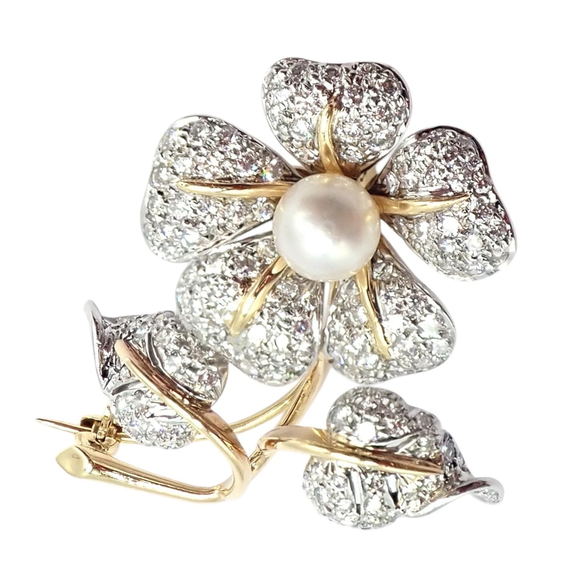 Vintage! Tiffany & Co 18k Yellow Gold Platinum Diamond Pearl Pin Brooch: Vintage Tiffany & Co. brooch crafted in 18k yellow gold and platinum features a graceful floral motif adorned with pavé-set diamonds. A lustrous pearl centers the bloom, while sculpted leaves and