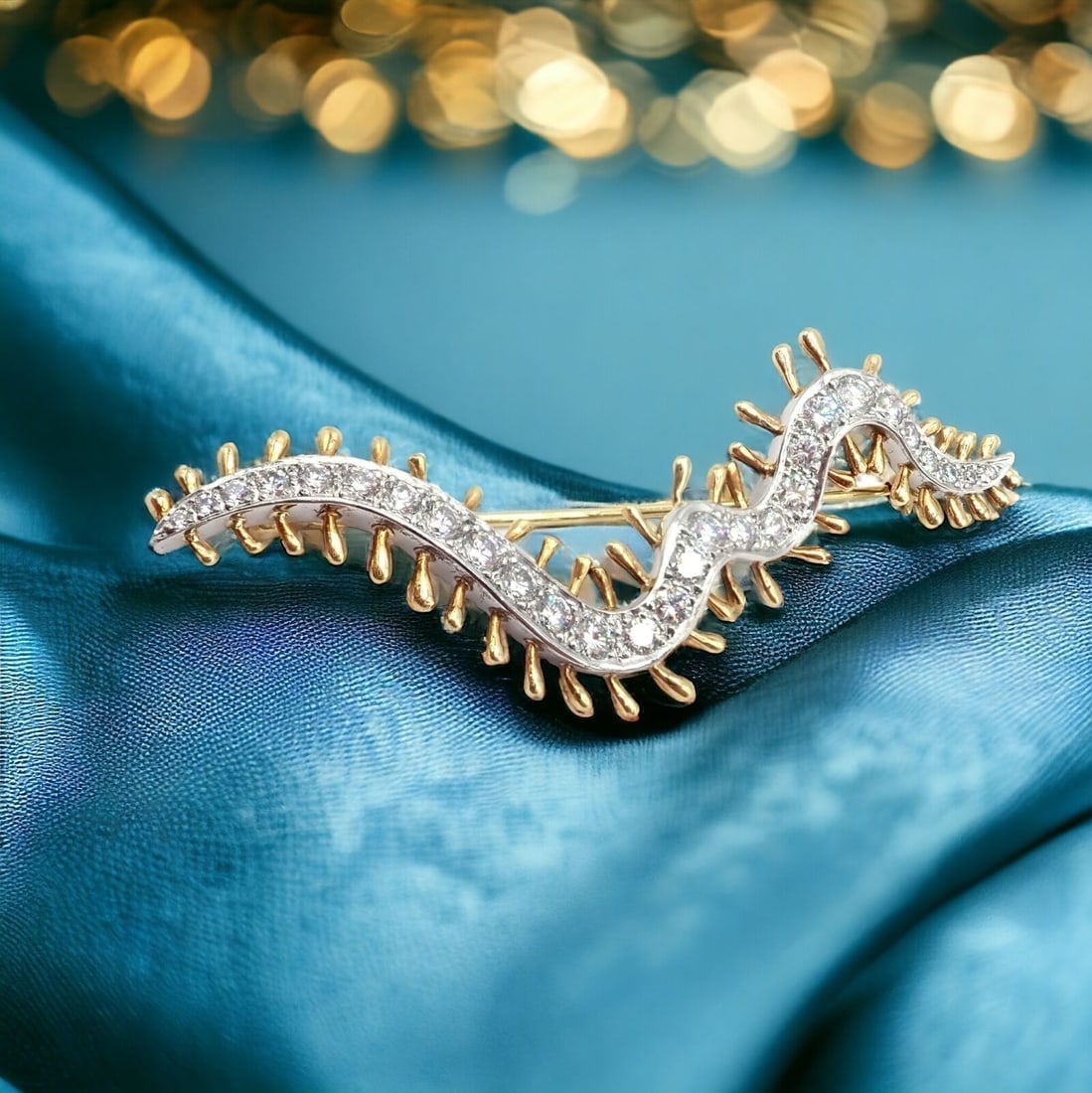 Vintage Tiffany & Co. Platinum 18k Yellow Gold Diamond Centipede Pin Brooch 1988: Vintage Tiffany & Co. Platinum 18k Yellow Gold Diamond Centipede Pin Brooch 1988 Vintage Tiffany & Co. Platinum 18k Yellow Gold Diamond Centipede Pin Brooch 1988 Product Description About This Piece: 