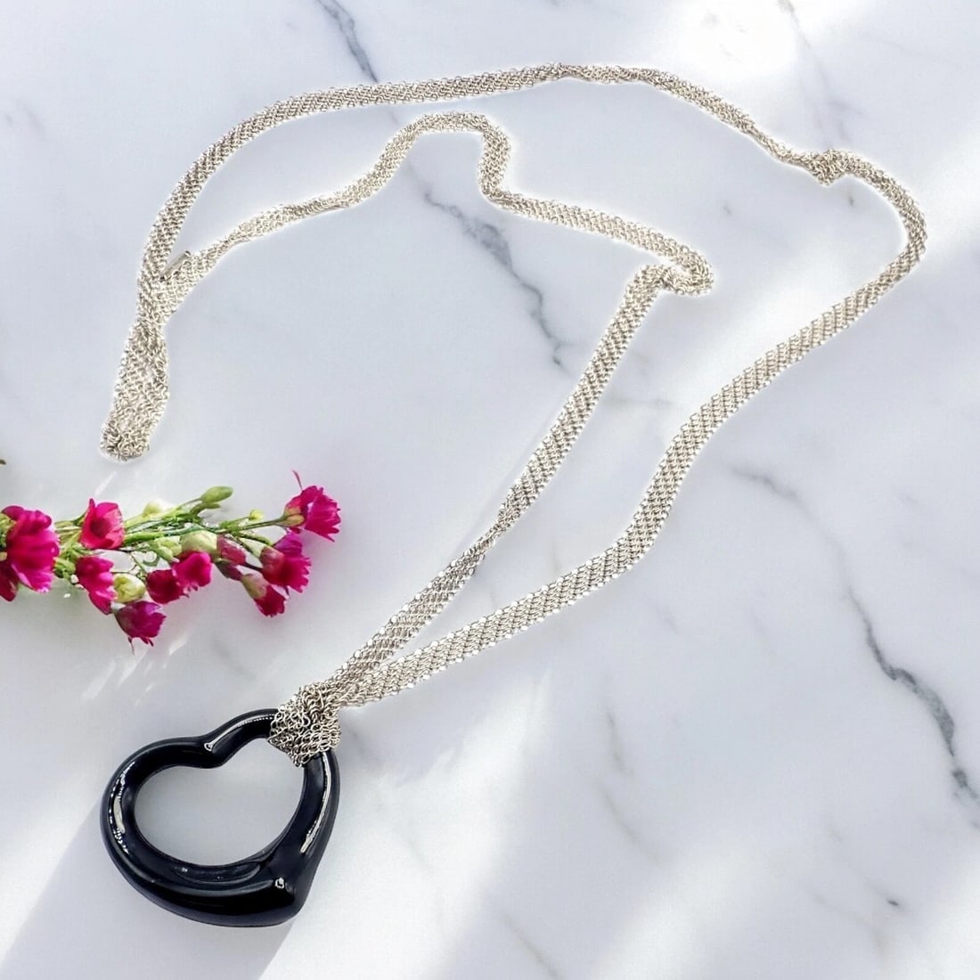 Tiffany & Co Silver Peretti 35mm Large Open Onyx Heart Pendant 28" Mesh Necklace: Tiffany & Co Silver Peretti 35mm Large Open Onyx Heart Pendant 28" Mesh Necklace Tiffany & Co Silver Peretti 35mm Large Open Onyx Heart Pendant 28" Mesh Necklace Product Description About This Piece: 