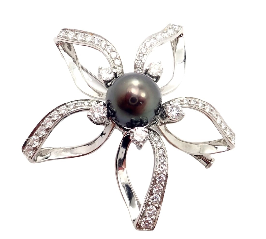 Rare! Authentic Mikimoto Platinum Diamond Tahitian South Sea Pearl Brooch Pin: Rare! Authentic Mikimoto Platinum Diamond Tahitian South Sea Pearl Brooch Pin Rare! Authentic Mikimoto Platinum Diamond Tahitian South Sea Pearl Brooch Pin Product Description About This Piece: The Ra
