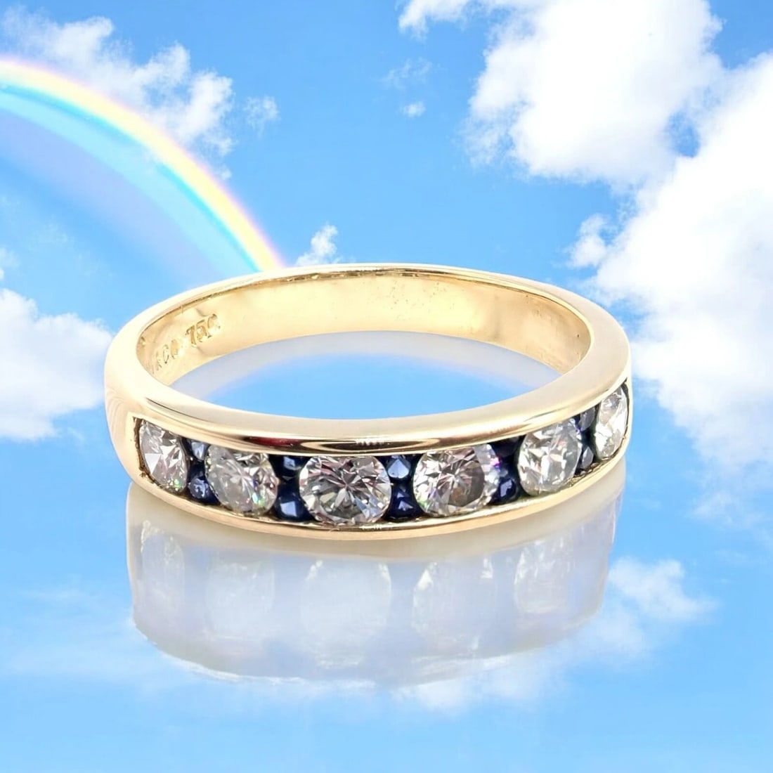 Authentic! Tiffany & Co 18k Yellow Gold 1.20ctw Diamond Sapphire Band Ring sz 5: Authentic Tiffany & Co. 18k yellow gold band ring featuring 1.20 carats total weight of dazzling round diamonds and rich blue sapphires in a sleek channel setting. A refined and elegant piece, perfect