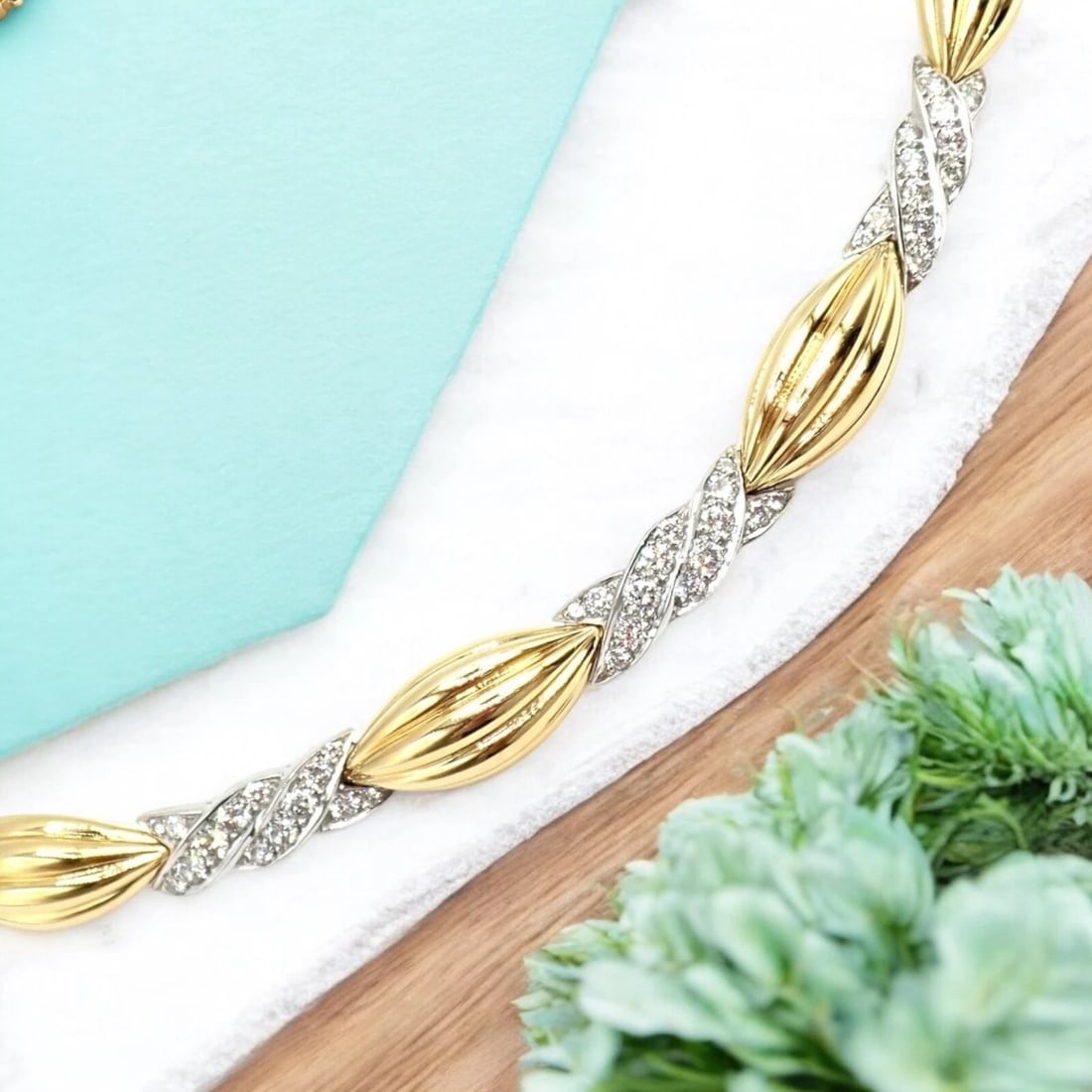 Authentic! Tiffany & Co 18k Yellow + White Gold 4ct Diamond Candy Necklace: In a playful nod to the era’s vibrant fashion, this Tiffany & Co ?Candy? necklace from the 1970s glistens with an impressive four carats of diamonds, meticulously set in 18k yellow and white gol