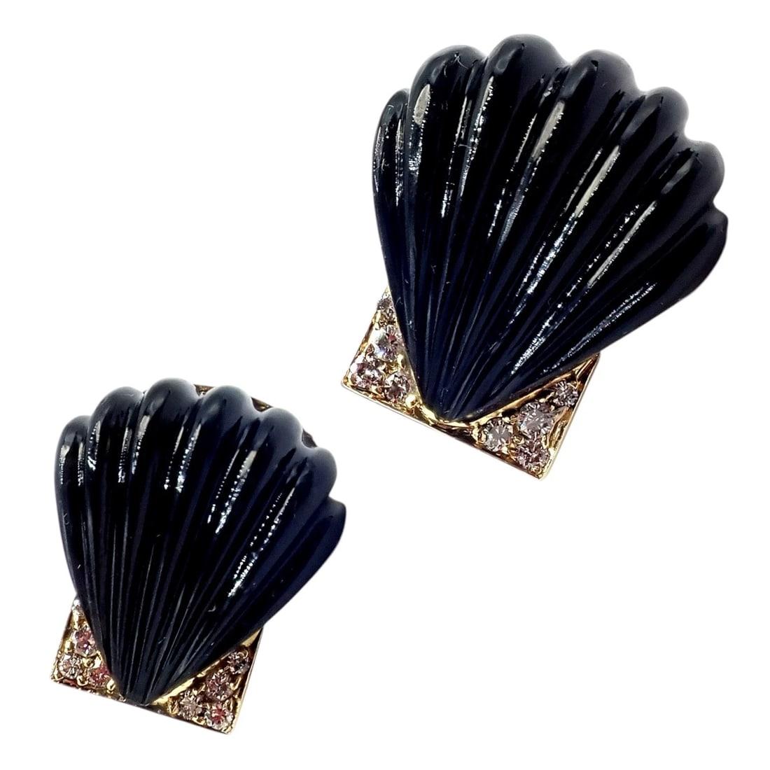 Vintage Estate Cartier Yellow Gold Diamond Onyx Shell Earrings: Vintage Estate Cartier yellow gold earrings showcase sculptural black onyx carved into elegant shell motifs, embodying bold, timeless design. Set atop geometric gold bases accented with sparkling diam
