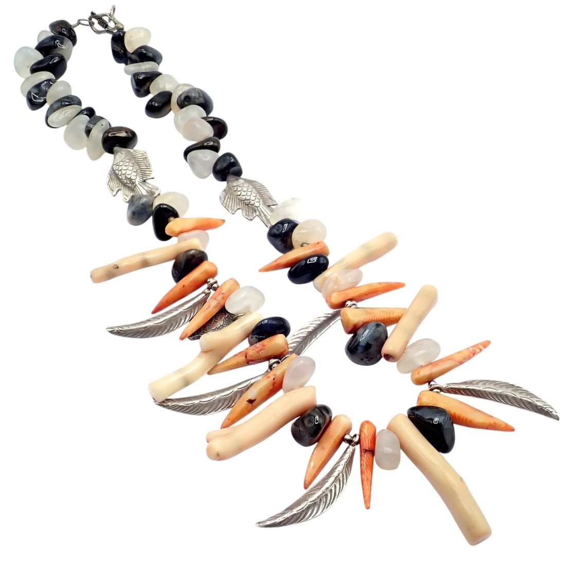 Rare! Mario Buccellati Free Time Silver Large Flying Fish Feather Coral Necklace: Rare Mario Buccellati Free Time necklace features striking coral branches, smooth river stones, and dark agate beads. Accented with finely crafted sterling silver flying fish and feather charms, it em