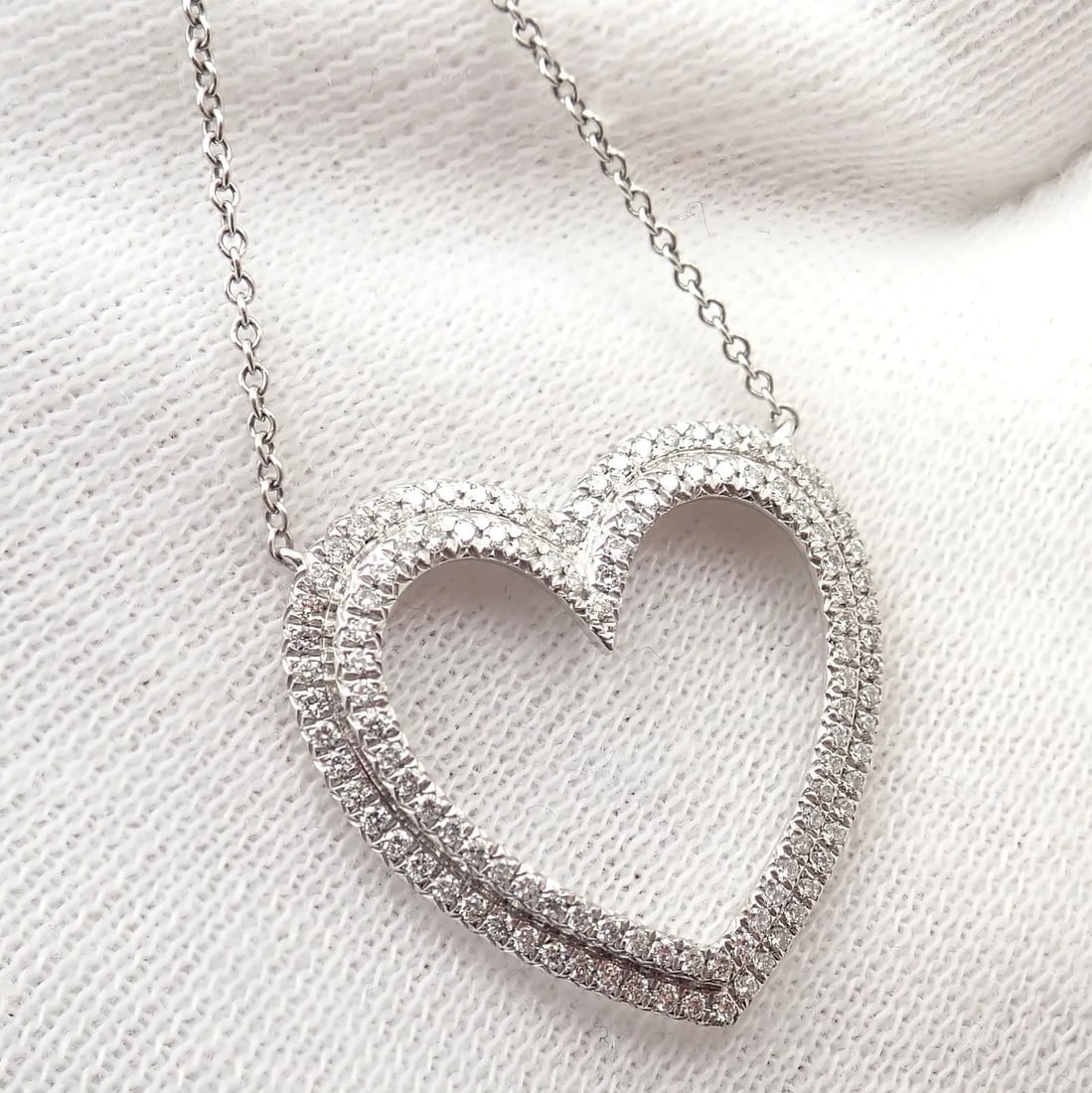 Tiffany & Co Platinum Diamond Heart Double Metro Medium Pendant Necklace: Tiffany & Co Platinum Diamond Heart Double Metro Medium Pendant Necklace Tiffany & Co Platinum Diamond Heart Double Metro Medium Pendant Necklace Product Description About This Piece: Metal: Platinum 