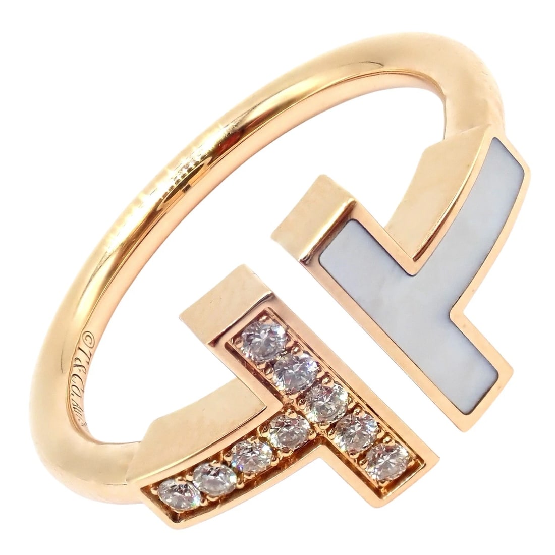 Authentic Tiffany & Co. 18k Yellow Gold Diamond Mother of Pearl T Wire Ring sz 6: Authentic Tiffany & Co. T Wire ring crafted in radiant 18k yellow gold, featuring luminous mother of pearl inlay and sparkling round brilliant diamonds. This elegant size 6 design showcases the iconic
