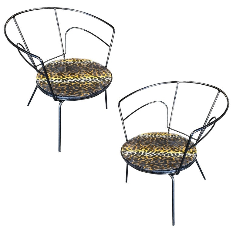 Atomic Age Iron Wire Side Armchair w/ Leopard Print Seat, Pair: Pair of modernist Mid Century era iron wire armchairs with leopard print seat. Circa 1950 Reserve: $1,104.00 Shipping: Domestic: Shipping rates are determined by destination International: Foreign shi