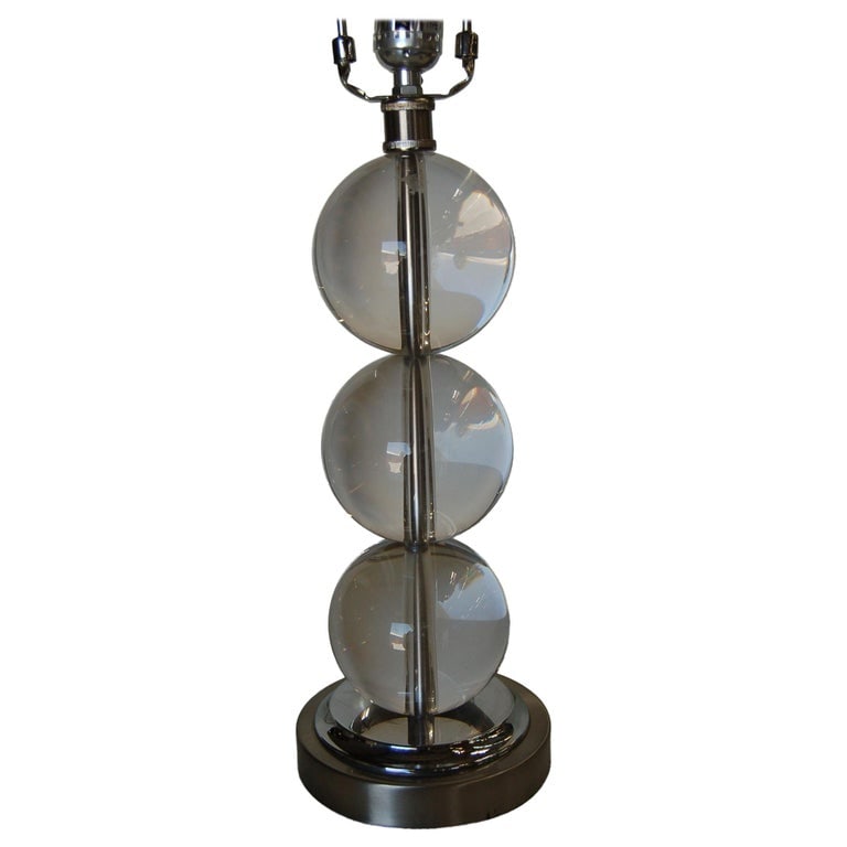 Large Stacked Three Large Crystal Ball Table Lamp: Mid-Century Modern stacking large crystal three ball table lamp on a chrome base. Pair available. Measures: 6" diameter x 18 tall. Reserve: $587.00 Shipping: Domestic: Shipping rates are determined by