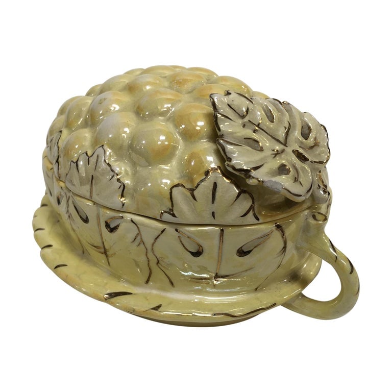 Vintage Yellow Lusterware Covered Serving Dish with Grapes by Sasha: This vintage covered dish is made out of porcelain ceramic. It depicts bright yellow grapes with green-tinted grape leaves, hand-painted with gold veins and finished with a lusterware glaze. This lust