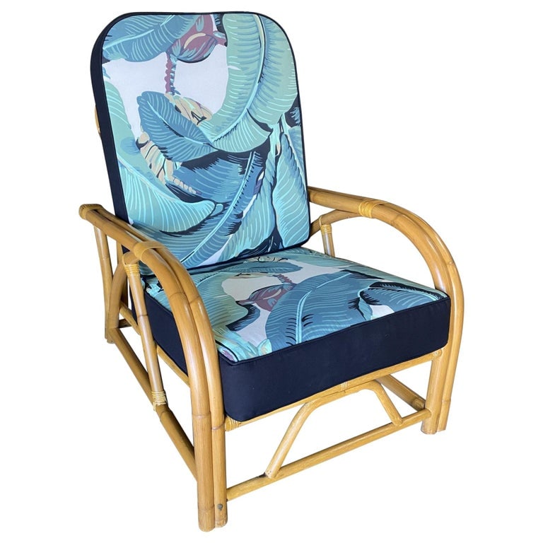 Restored Two-Strand "40s Transition" Adjustable Rattan Lounge Chair: Paul T. Frankl inspired two-strand "1940s Transition" rattan lounge chair. The chair features an arm style that flows simultaneously into the rounded back of the chair with a decorative 3-pole design